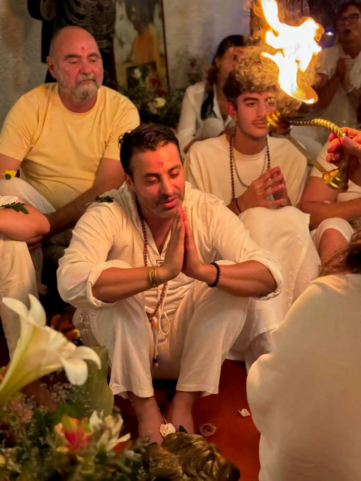 Group of people in prayer.
