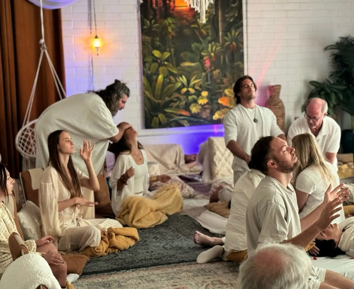Group of people in white clothing.