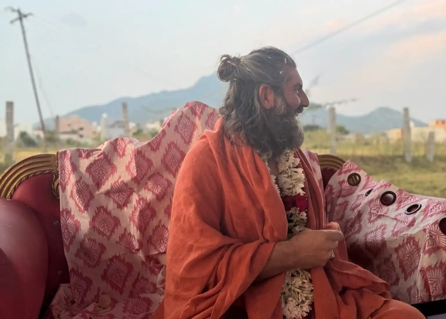 Monk in orange robe.